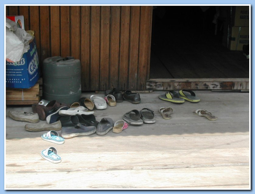 Shoes outside house, Chew clan jetty